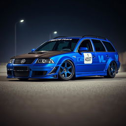 A stunning blue 2001 widebody VW Passat R36 wagon presented as a drift car, featuring an eye-catching race livery and a sleek carbon hood