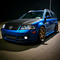 A blue 2001 widebody VW Passat R36 L wagon drift car, featuring a carbon hood and aggressive aerodynamic styling
