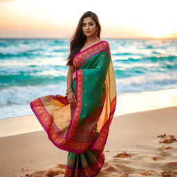 A stunning photoshoot of an Indian woman gracefully draped in a colorful saree while standing on a picturesque beach