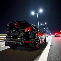 A black Ford Fiesta ST equipped with an extreme body kit and a large rear spoiler, parked on a dimly lit highway at night