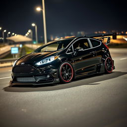 A sleek black Ford Fiesta ST in a time attack style, featuring an extreme wide bodykit and a large rear spoiler, parked on a highway at night