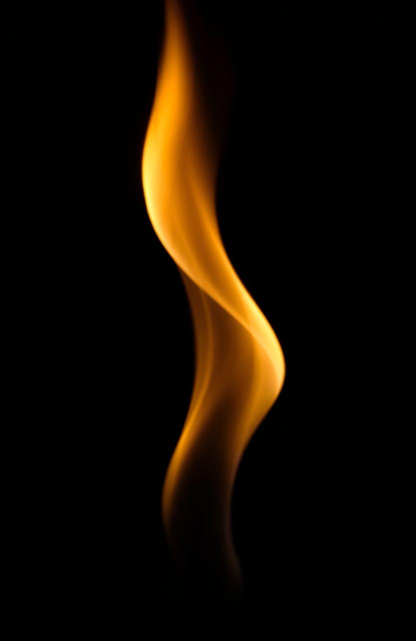 A delicate and fragile flame flickering gently against a dark background, casting soft shadows and a warm glow