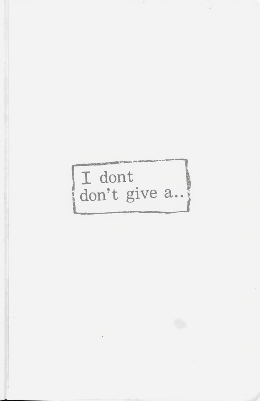 An all-white cover with a faded ink stamp in the center that reads 'I don’t give a…'