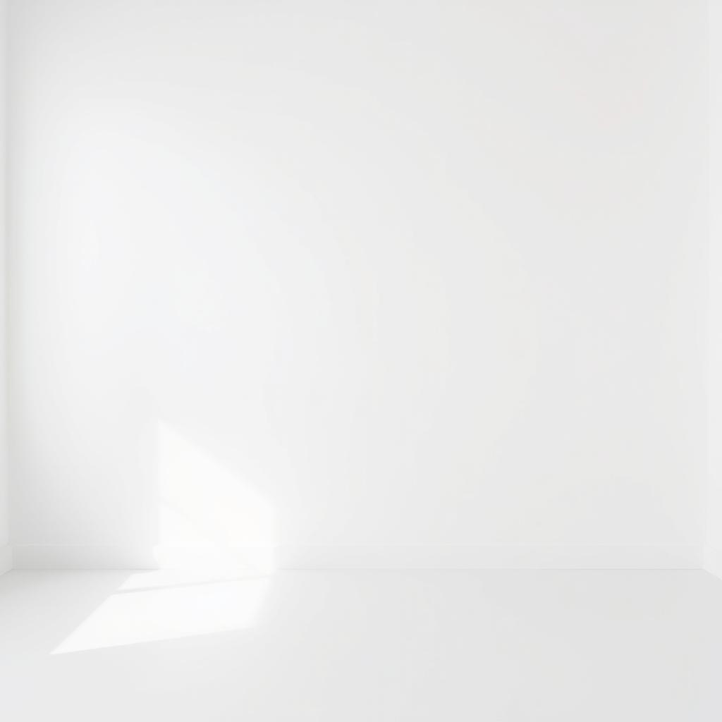 A perfectly white wall of a bedroom, minimalistic and devoid of any furnishings or decorations