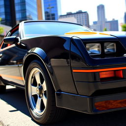 A sleek black 1989 Chevrolet Monza with striking orange accents, showcasing its classic lines and retro design
