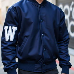 A stylish navy blue varsity jacket, featuring a bold white letter 'W' embroidered on the front left side