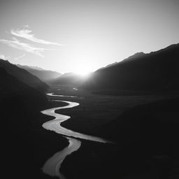 A stunning black and white image capturing an ethereal landscape at sunrise