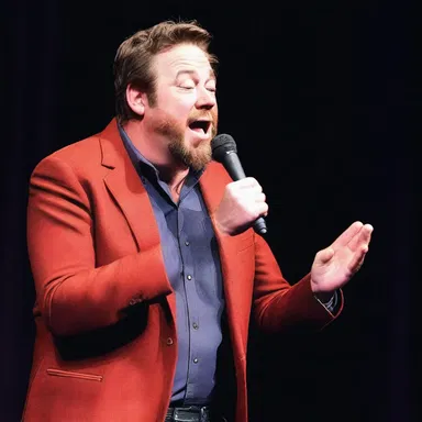 At the comedy show, the comedian told a funny joke about the quirky aspects of Americana, leaving the audience in stitches.