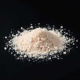 A heap of pink salt powder scattered on a surface, with no other objects in the image