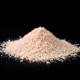 A mound of pink salt powder scattered on a flat surface, with the grains appearing very fine and crystalline, showcasing a color range predominantly in reds, pinks, and whites