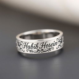 A beautifully crafted ring featuring intricate designs and the engraved name 'Habib Hosein' in elegant calligraphy