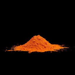 An image of a mound of paprika powder spilled on the ground, with no other objects present in the scene