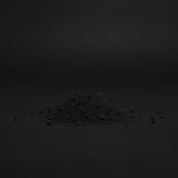A mound of finely ground black powder scattered on a plain, completely black background