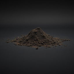 A mound of black and brown powder scattered across a surface, with a completely black background, ensuring there is nothing else in the image