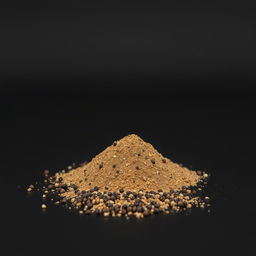 A mound of black pepper powder spilling on a flat surface, with no other objects present in the image
