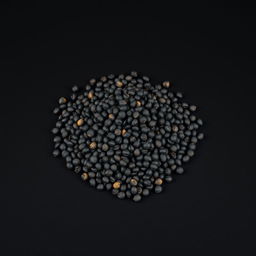 A mound of black peppercorns spilling on a completely black surface, with no other objects in the image