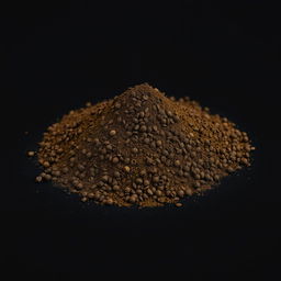 A mound of black pepper powder neatly piled on a flat surface, with no other objects in the image
