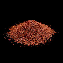 A pile of pul biber (red pepper flakes) scattered on the ground, viewed from a completely front angle