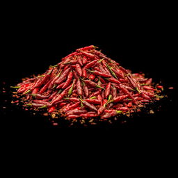A heap of Aleppo pepper spilled on the ground, with nothing else in the image