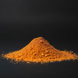 A heap of Aleppo pepper powder spilled on the ground, with nothing else in the image