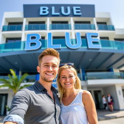 A modern hotel facade featuring the word "BLUE" prominently displayed