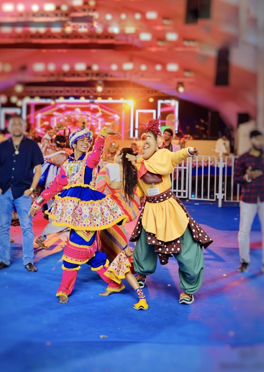 A vibrant scene showcasing traditional dancers in colorful attire performing a lively dance