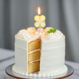 A stunning white birthday cake with elegant decorations, featuring a delightful four-leaf clover candle on top, glowing softly