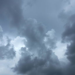 A dramatic sky filled with dark and gloomy clouds, creating a sense of foreboding and melancholy