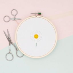 A simple and minimalist design featuring a needle and thread stitching a daisy flower on fabric