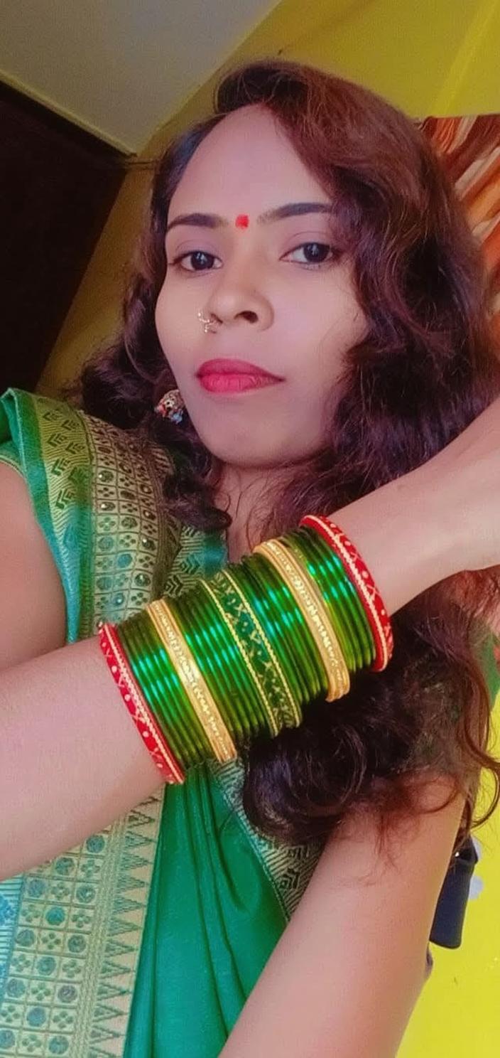 A portrait of a woman showcasing vibrant traditional attire