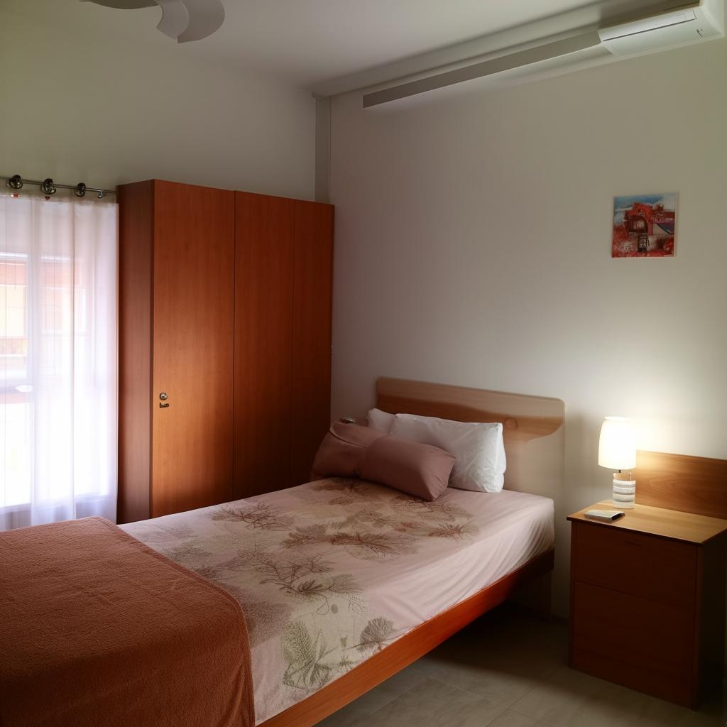 A cozy boarding house boasting free wifi, air conditioning, a wardrobe, study desk, bed, and an ensuite bathroom. Highlighting 24-hour security enforced with CCTV for optimum comfort and safety.