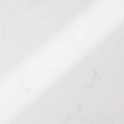 A smooth and radiant white surface, resembling a polished marble finish, softly reflecting light
