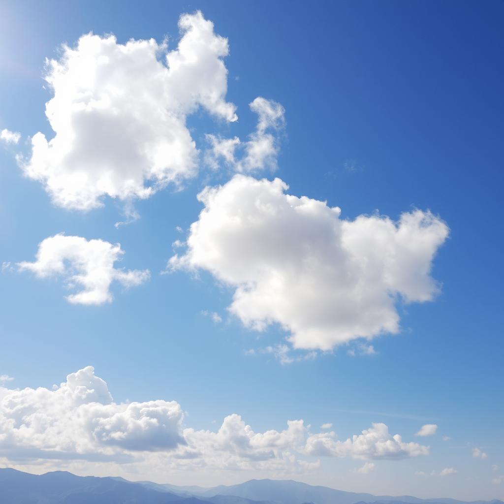 A serene sky filled with fluffy white clouds gently drifting across a bright blue background