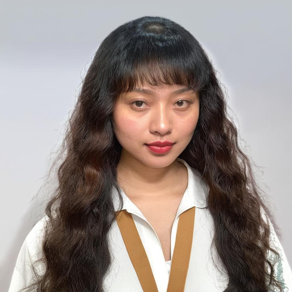 Elegant Portrait of a Young Woman with Curly Hair