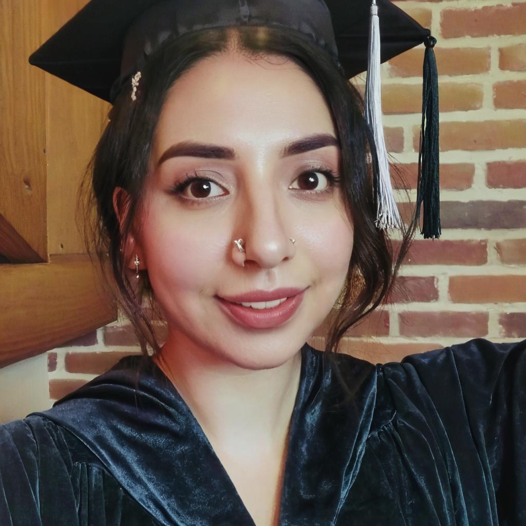 My face in graduation gown