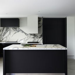 Modern, luxurious, handleless black kitchen with a large island centerpiece adorned with white Calacatta marble