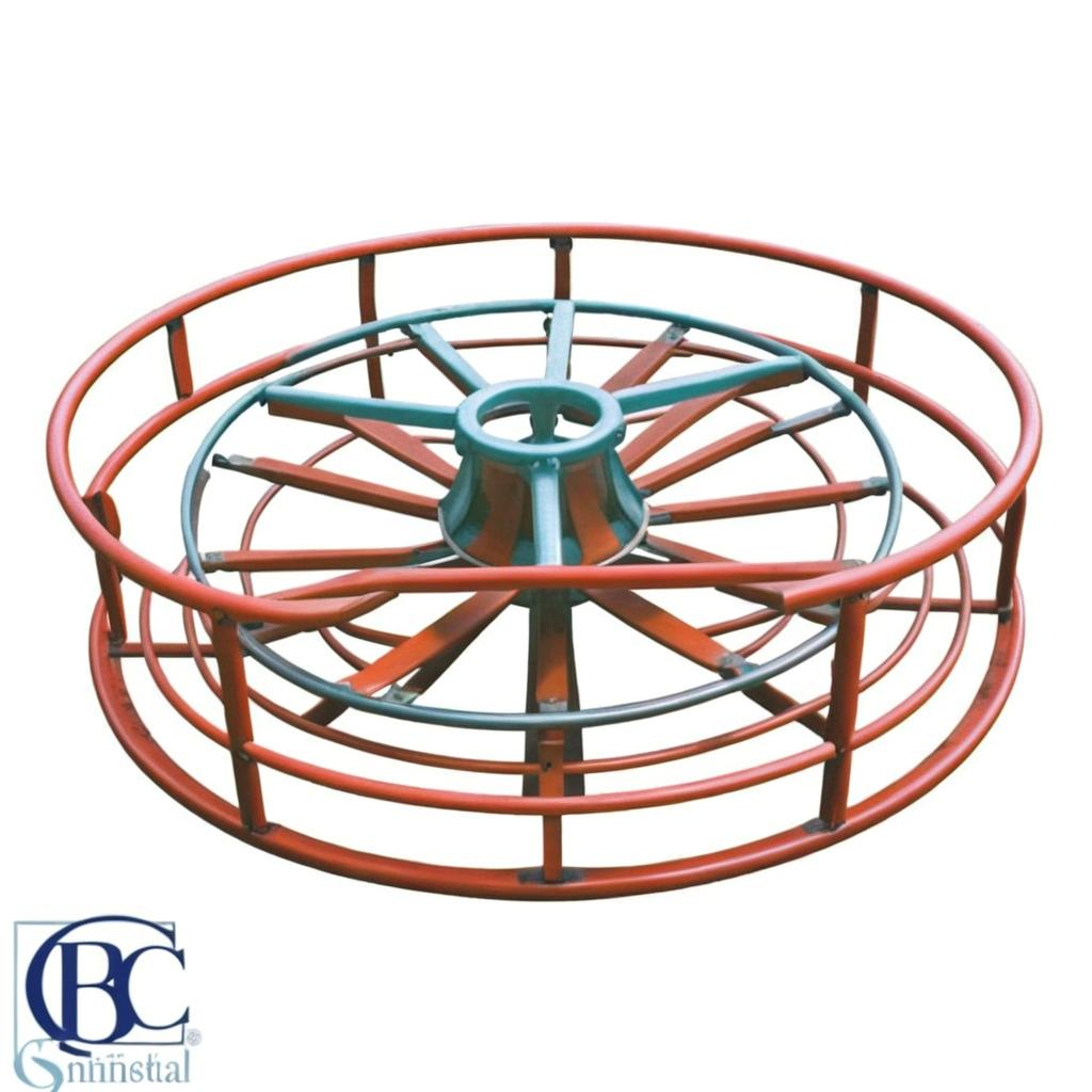 From the vision of someone who sat on a seat of the simple metal merry-go-round and spins around. The middle of simple metal merry-go-round is shining. Hands are shown on the middle.