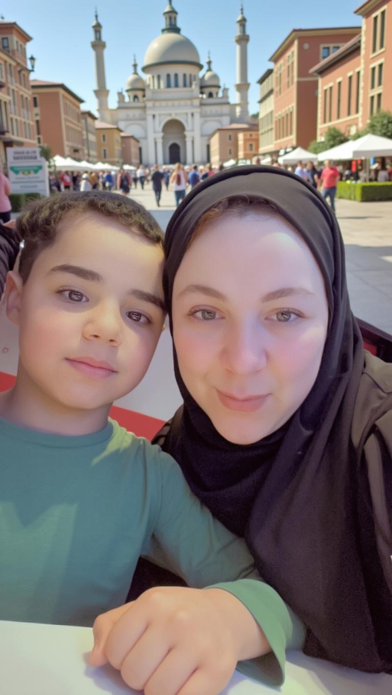 A candid photo of a woman wearing a black hijab alongside a young boy with short black hair, both smiling softly