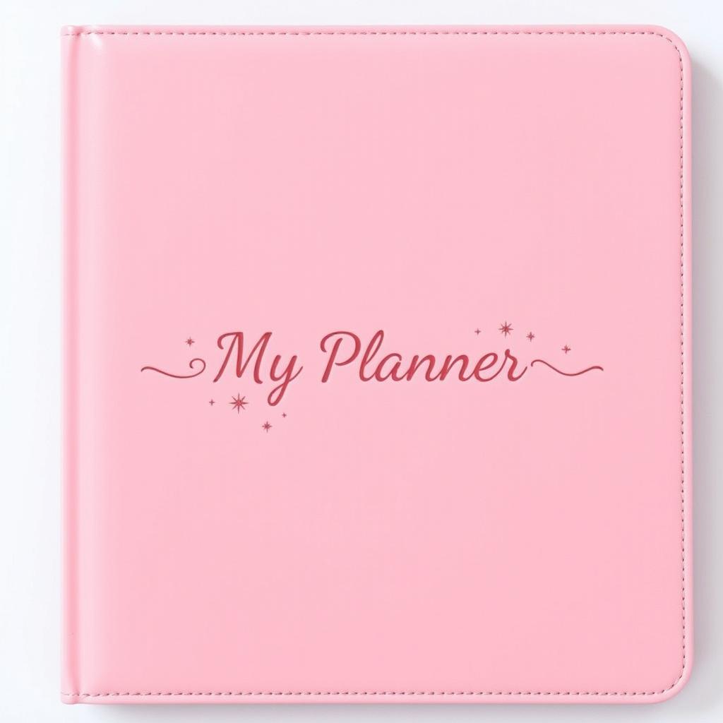 A sleek and minimalist planner cover in a solid pink color, featuring a smooth matte finish