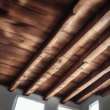 The old wooden beams on the ceiling alligator after being exposed to extreme temperature changes.