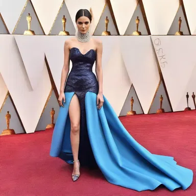 Instead of wearing the typical formal attire, she decided to alternatively dress in a bold and avant-garde fashion for the red carpet event.