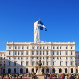 A grand, enormous, and beautiful white palace standing majestically in front of a historic civic square