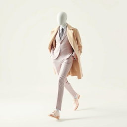 A visually striking portrayal of pastel minimalism in motion, featuring a faceless model dressed in a fitted pastel suit accentuated by an oversized coat draped effortlessly over their shoulders