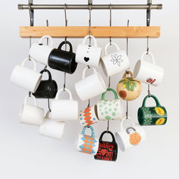 A vertical design featuring Instagrammable hanging mugs, showcasing a modern and industrial aesthetic