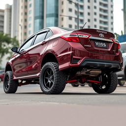 A dramatically modified second-generation Toyota Vios, elevated to resemble the height of an SUV