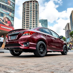 A modified second-generation Toyota Vios featuring an elevated ground clearance of 205 mm, showcasing its sporty and rugged design
