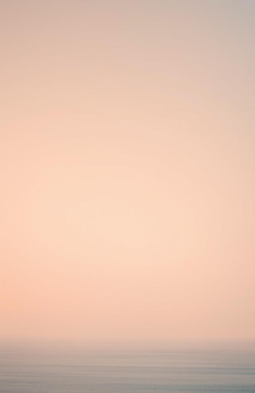 A serene backdrop featuring a soft pastel gradient that transitions from peach to muted blue, creating a calming atmosphere