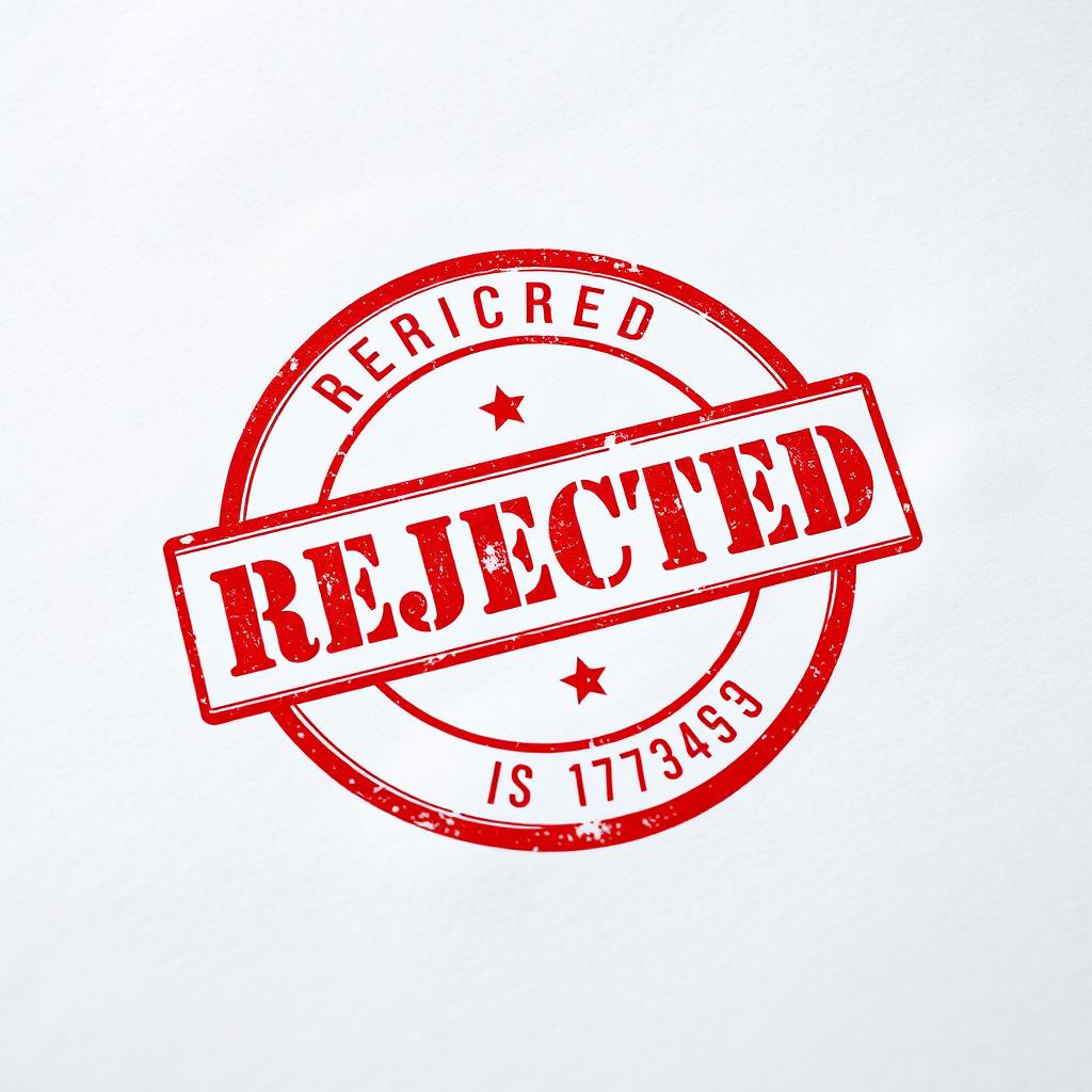 A bold, red 'REJECTED' stamp prominently featured in the center of a textured white document