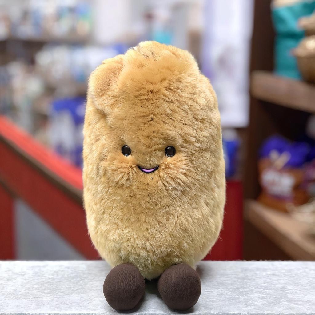 Adorable Hand-Drawn Potato Plush Toy Illustration | Warm & Whimsical