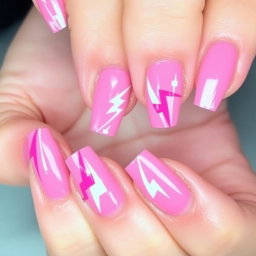 A beautifully designed manicure featuring a combination of pink and white colors, decorated with lightning bolt patterns